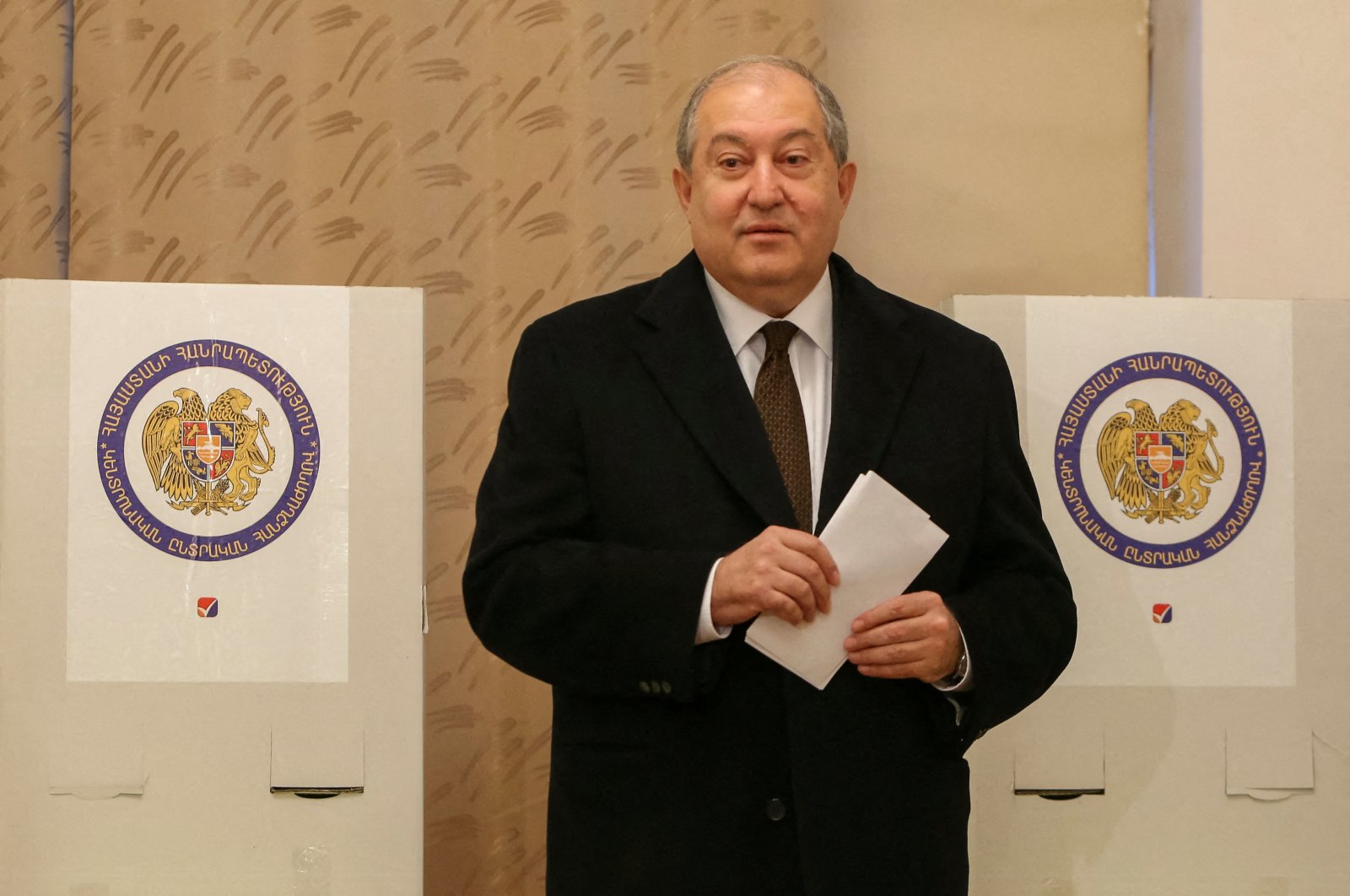 Armenian President Armen Sarkissian votes during an early parliamentary election in Yerevan, Armenia, Dec. 9, 2018. (Reuters File Photo)