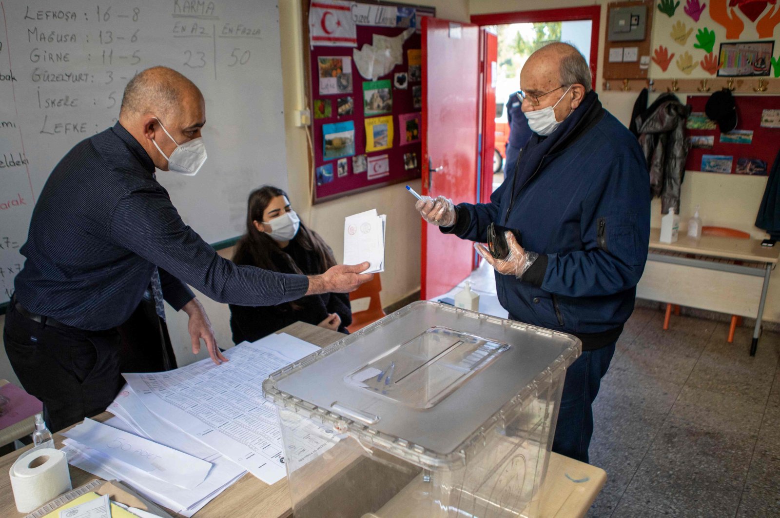 A Turkish Cypriot arrives to cast his ballot at a polling station in Lefkoşa, Turkish Republic of Northern Cyprus, Jan. 23, 2022. (AFP Photo)