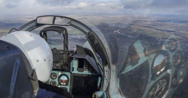  A view from the cockpit of a Russian Su-30 fighter jet as it takes part in a training mission in Krasnodar Region, Russia, on Jan. 19, 2022. (AP Photo)