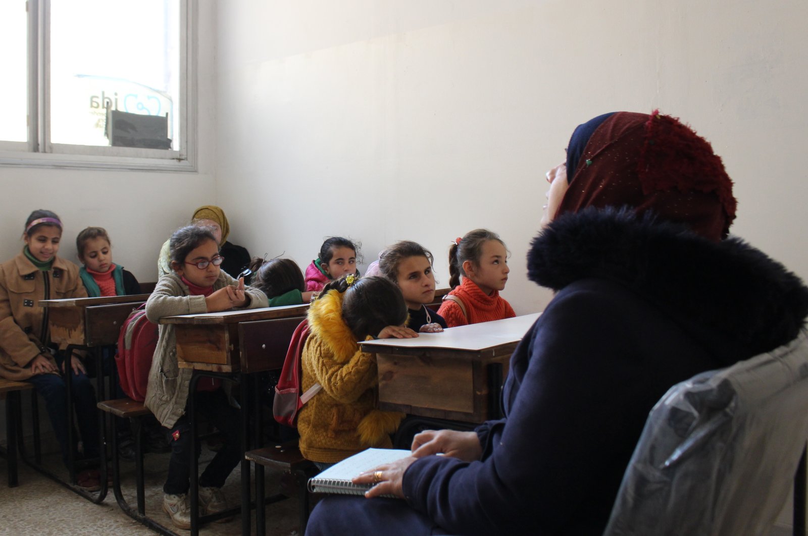 A teacher conducts a lesson for visually impaired children in northwestern Syria&#039;s Idlib, Jan. 24, 2022. (AA Photo)