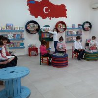 Children read books in a "zero waste" library, in Muğla, southwestern Turkey, Jan. 18, 2022. (IHA Photo)