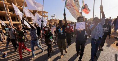 Protesters march during a rally against military rule following last month's coup in Khartoum, Sudan, Jan. 24, 2022. (Reuters Photo)