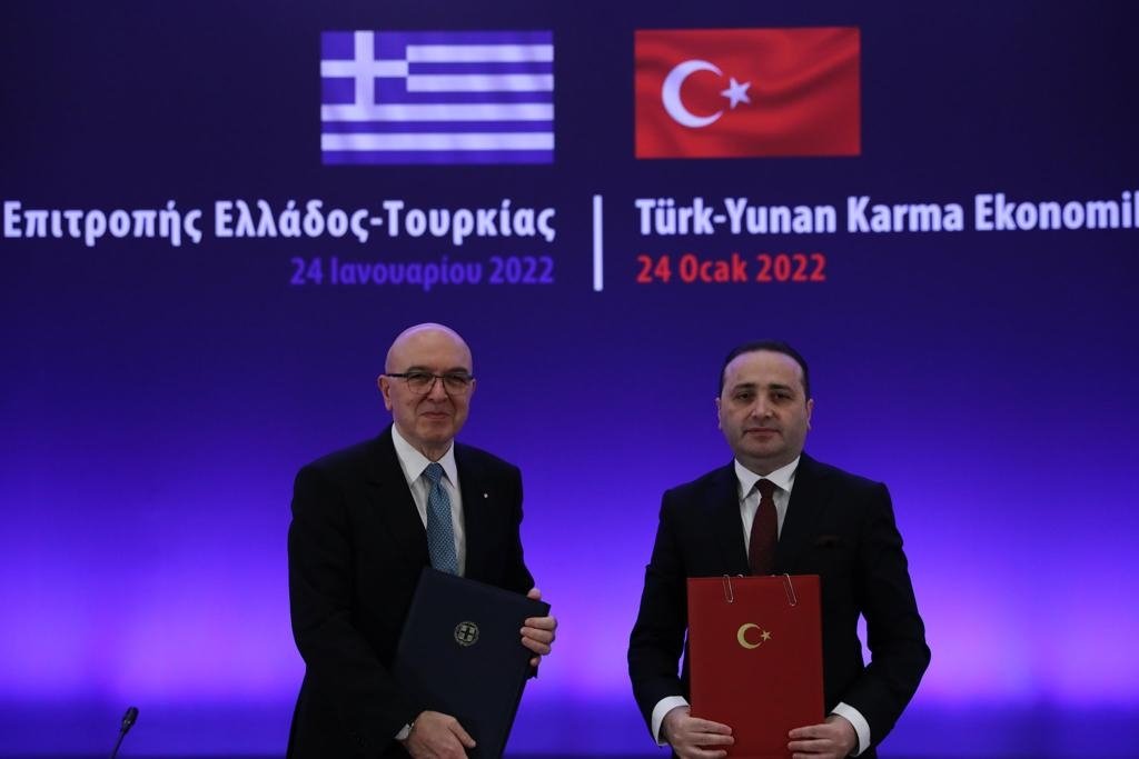 Greek Deputy Foreign Minister for Economic Diplomacy Kostas Frangogiannis (L) and Turkey&#039;s Deputy Trade Minister Mustafa Tuzcu during the signing of the protocol, Athens, Greece, Jan. 24, 2022. (Photo: @ticaret )