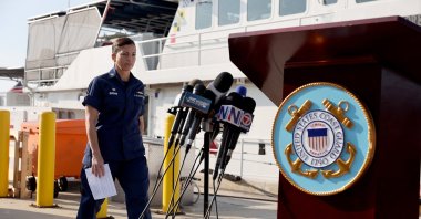 U.S. Coast Guard Miami Commander Capt. Jo-Ann F. Burdian arrives to speak during a press conference about the ongoing search for survivors of a capsized vessel in Miami, Florida, U.S., Jan. 26, 2022. (AFP Photo)