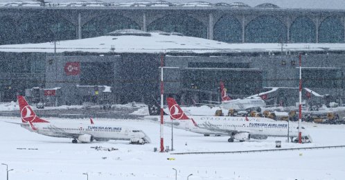 Aircraft are parked on the tarmac of Istanbul Airport, Turkey, Jan. 25, 2022. (AFP PHOTO)