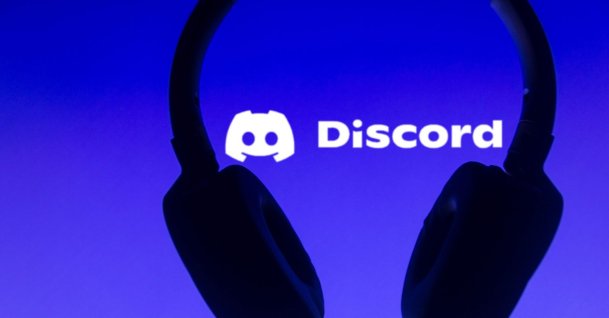 In this photo illustration, the Discord logo is displayed along with a headset. (Reuters Photo)