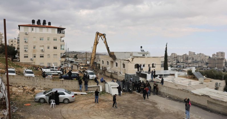 Israeli machinery demolishes a Palestinian house in al-Tur, East Jerusalem, occupied Palestine, Jan. 25, 2022. (AFP Photo)
