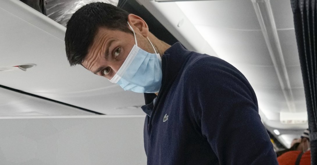 Novak Djokovic is seen onboard a plane to Belgrade, Dubai, UAE, Jan. 17, 2022. (AP Photo)