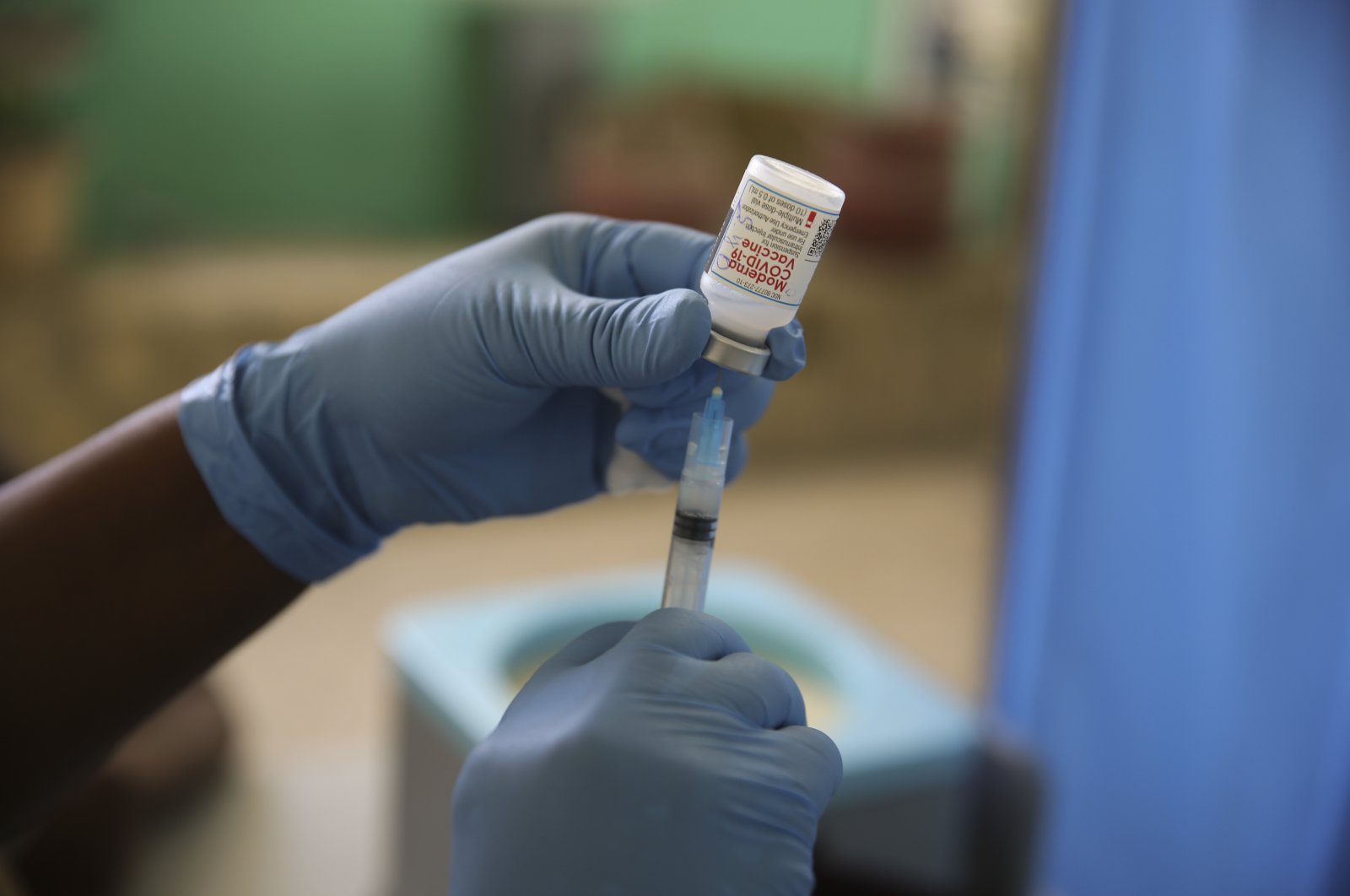 A medical worker prepares a shot of the Moderna vaccine during a vaccination campaign at Saint Damien Hospital in Port-au-Prince, Haiti, July 27, 2021. (AP Photo)