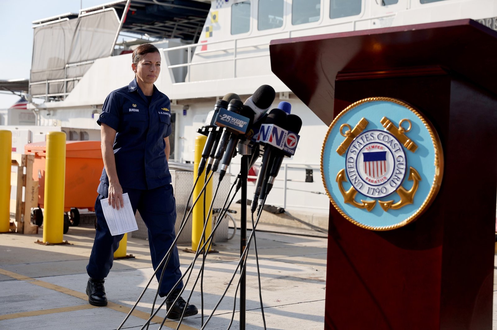 U.S. Coast Guard Miami Commander Capt. Jo-Ann F. Burdian arrives to speak during a press conference about the ongoing search for survivors of a capsized vessel in Miami, Florida, U.S., Jan. 26, 2022. (AFP Photo)