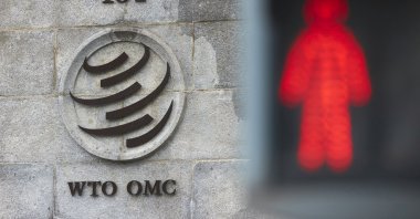 A logo is pictured on the World Trade Organisation (WTO) building before a ministerial meeting to discuss a draft agreement on curbing subsidies for the fisheries industry in Geneva, Switzerland, July 15, 2021. (Reuters Photo)