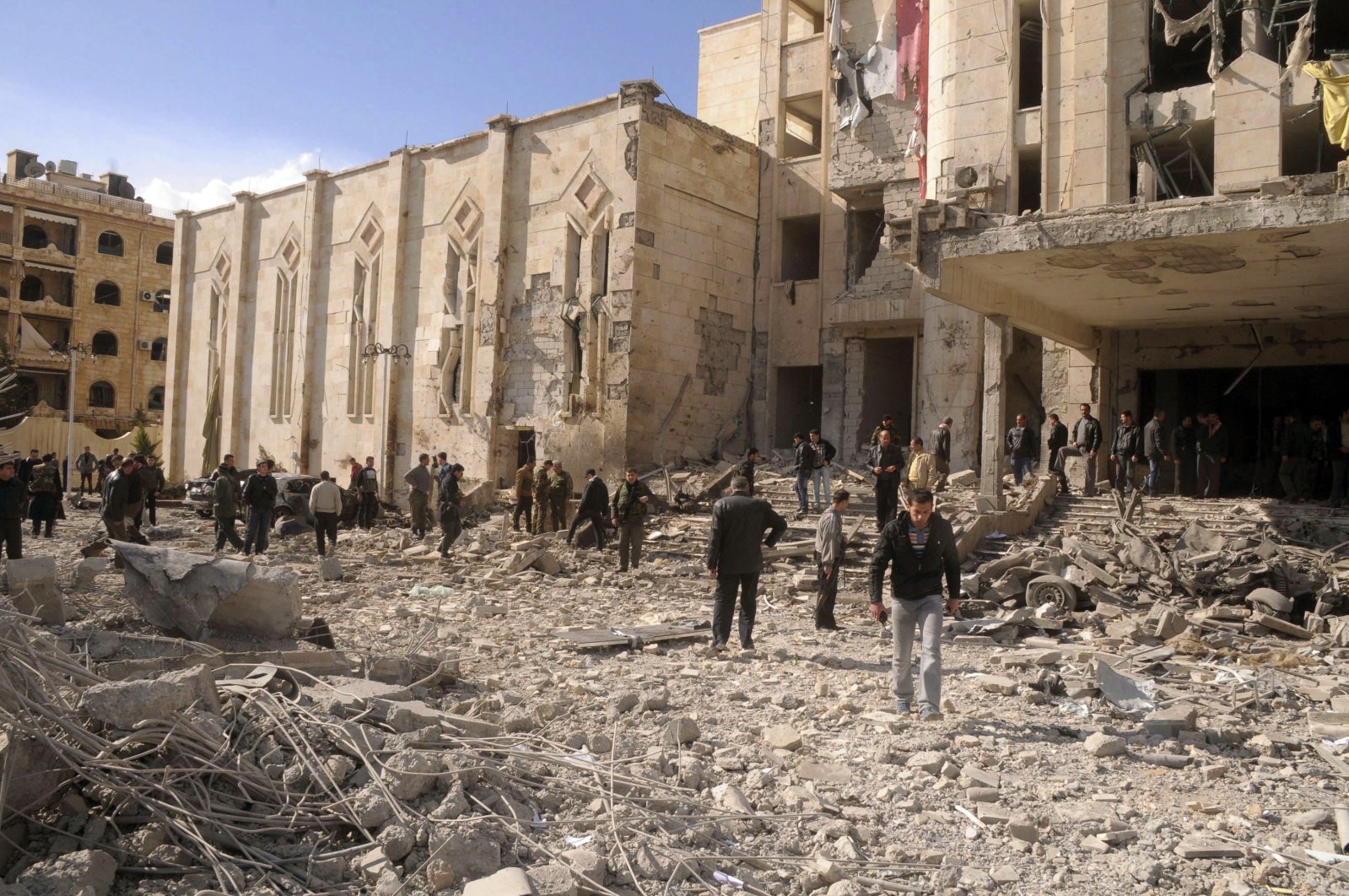 Syrian security inspects the site of an explosion in Syria&#039;s northern city of Aleppo, Feb. 10, 2012. (Reuters Photo)