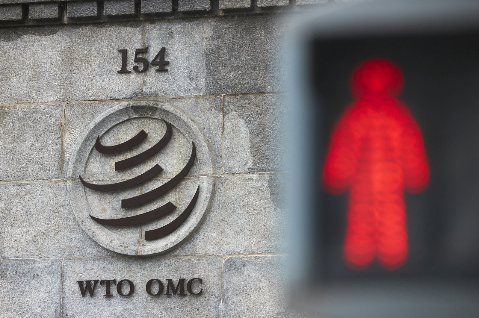 A logo is pictured on the World Trade Organisation (WTO) building before a ministerial meeting to discuss a draft agreement on curbing subsidies for the fisheries industry in Geneva, Switzerland, July 15, 2021. (Reuters Photo)