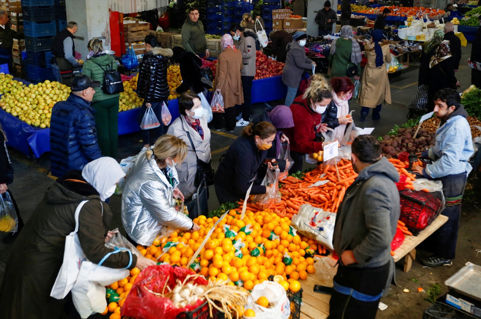 People shop at a market in Istanbul, Turkey, Jan. 4, 2022. (Reuters Photo)