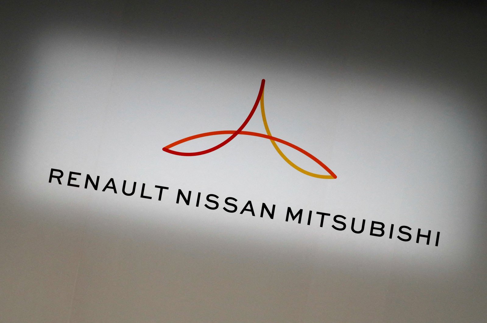 The logo of the Renault-Nissan-Mitsubishi alliance is seen ahead of a Renault, Nissan and Mitsubishi chiefs&#039; joint news conference in Yokohama, Japan, March 12, 2019. (Reuters Photo)