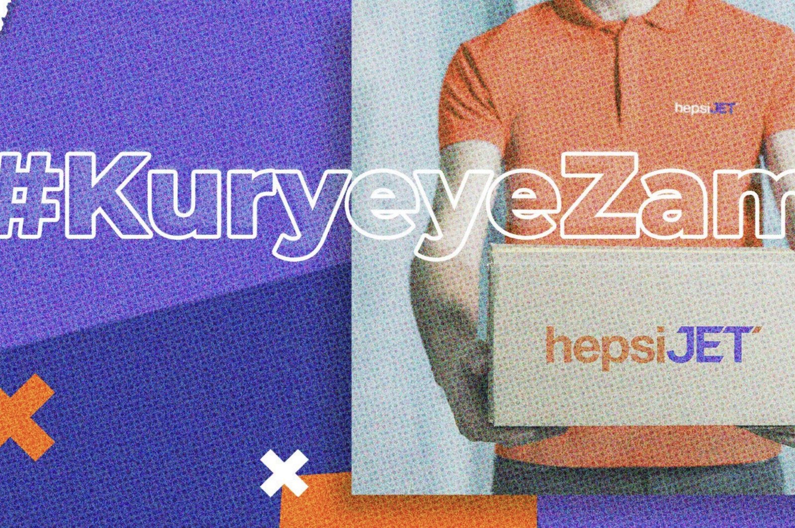 This image shared by HepsiJET employees on Twitter show a worker holding a box with the #KuryeyeZam (Raise to Carrier) hashtag over it (Photo taken from Twitter / hepsijetcalisan)