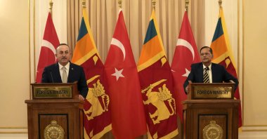Foreign Minister Mevlüt Çavuşoğlu (L) addresses media as his Sri Lankan counterpart Gamini Lakshman Peiris watches in Colombo, Sri Lanka, Jan. 28, 2022. (AP Photo)