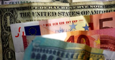 U.S. dollar and Euro bank notes are photographed in Frankfurt, Germany, in this illustration picture taken May 7, 2017. (Reuters Photo)