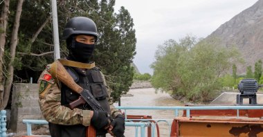 A service member of Kyrgyz special operations forces stands guard near Golovnoi water distribution facility outside the village of Kok-Tash in Batken province, Kyrgyzstan May 5, 2021. (Reuters File Photo)