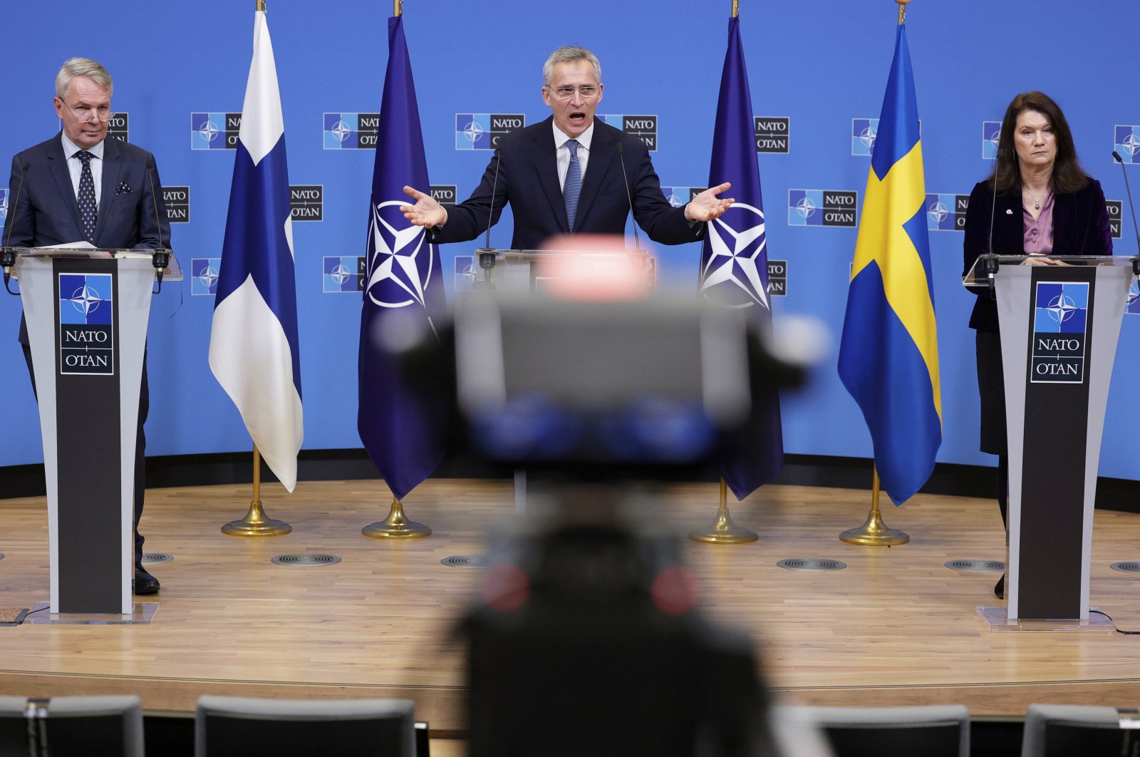NATO Secretary-General Jens Stoltenberg (C) participates in a media conference with Finland&#039;s Foreign Minister Pekka Haavisto (L) and Sweden&#039;s Foreign Minister Ann Linde (R) at NATO headquarters in Brussels, Belgium, Jan. 24, 2022. (AP File Photo)