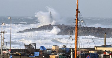 Waves from the North Sea crash over the outer pier during the Storm Malik, in the Harbour of Hirtshals, Denmark, Jan. 29, 2022. (Reuters Photo)