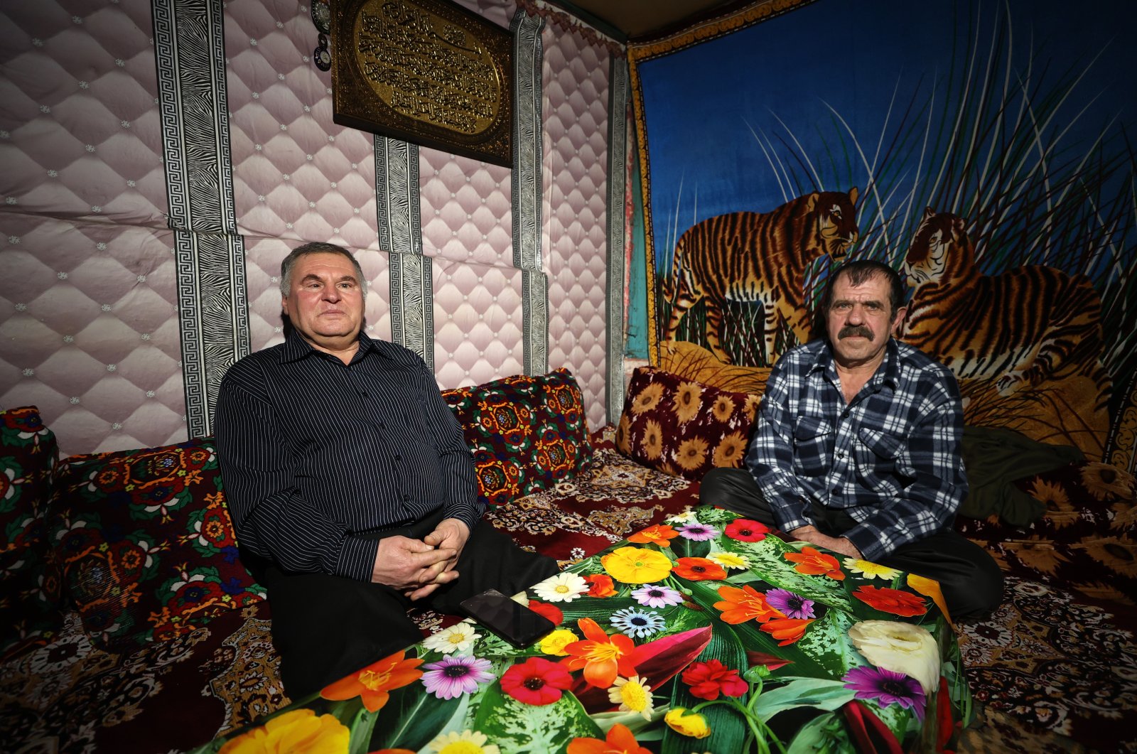 Sadri Ahmedov (L), head of the Association of Ahıska Turks of the Donetsk region, and Iskender Osmanov speak to AA in an interview, Donbass, Ukraine, Jan. 29, 2022. (AA Photo)