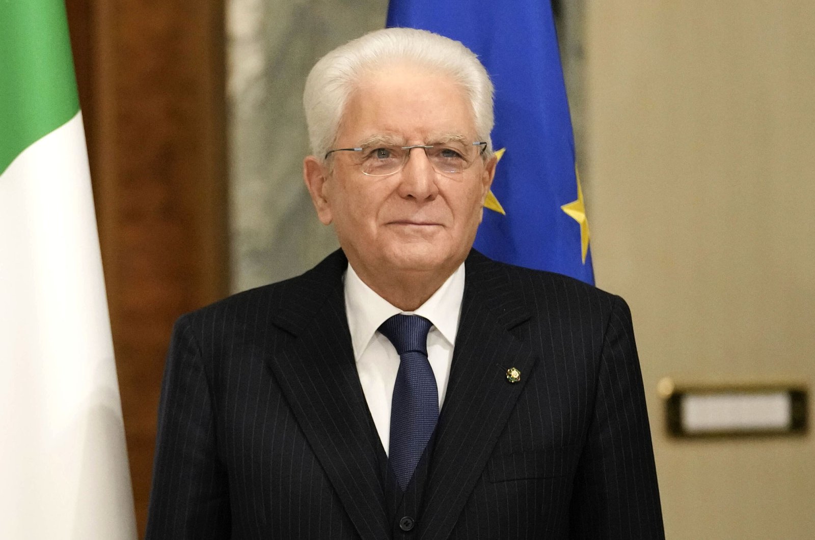 Italian President Sergio Mattarella stands with French President Emmanuel Macron at Quirinale Presidential Palace in Rome, Italy, Nov. 25, 2021. (AP Photo)