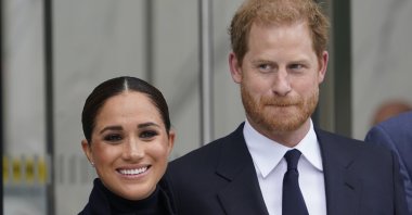 Meghan Markle and Prince Harry pose for pictures after visiting the observatory in One World Trade in New York, U.S., Sept. 23, 2021. (AP Photo)