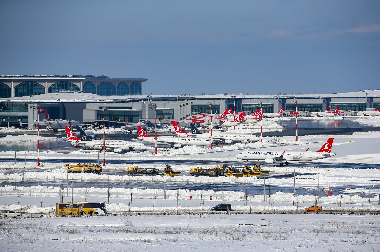 Planes are parked at snow-covered Istanbul Airport in Istanbul, Turkey, Jan. 26, 2022. (AP Photo)