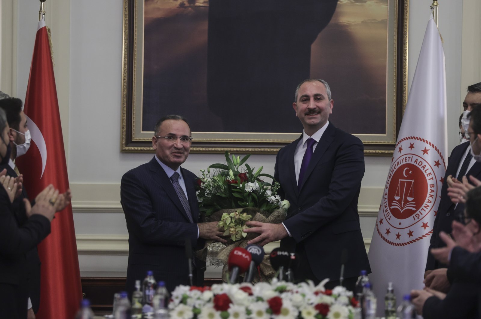 Turkey&#039;s new Justice Minister Bekir Bozdağ (L) and former minister Abdulhamit Gül are seen during a ceremony at the ministry in Ankara, Turkey, Jan.29, 2022 (AA Photo)