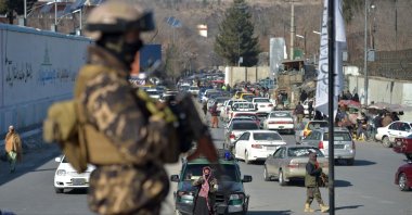 Taliban fighters stand guard before a protest in support of the Taliban regime at the Ahmad Shah Massoud square in front of the U.S. Embassy in Kabul, Afghanistan, Jan. 26, 2022. (AFP Photo)