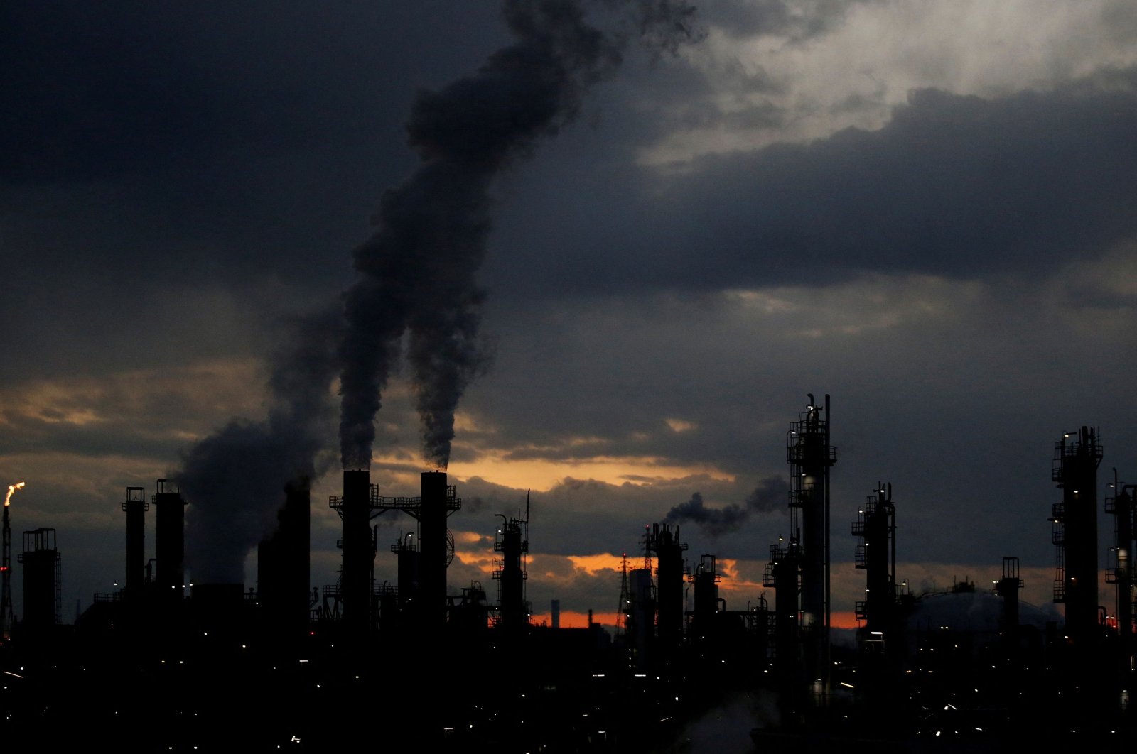 Steam is emitted from factories at sunset in the Keihin industrial zone in Kawasaki, Japan, Feb. 13, 2017. (Reuters Photo)