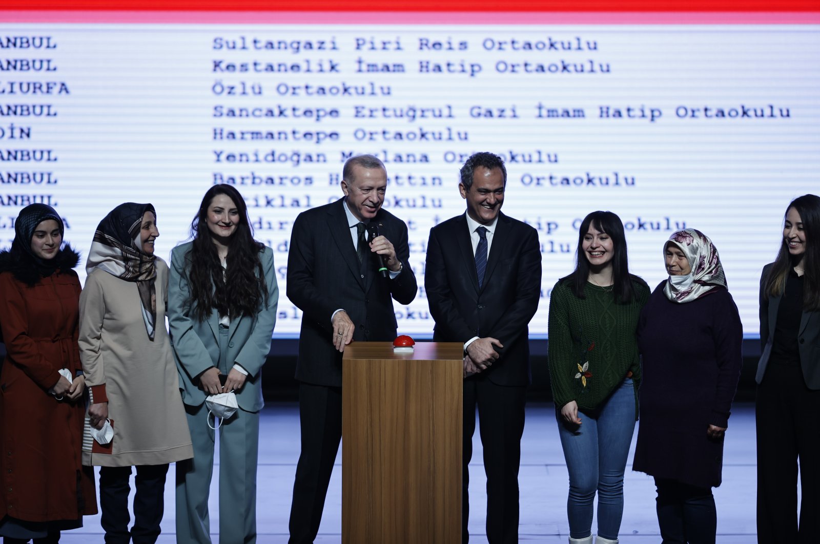 President Recep Tayyip Erdoğan (C) and Minister of National Education Mahmut Özer (4th R) pose with teachers, in the capital Ankara, Turkey, Jan. 31, 2022. (AA Photo)