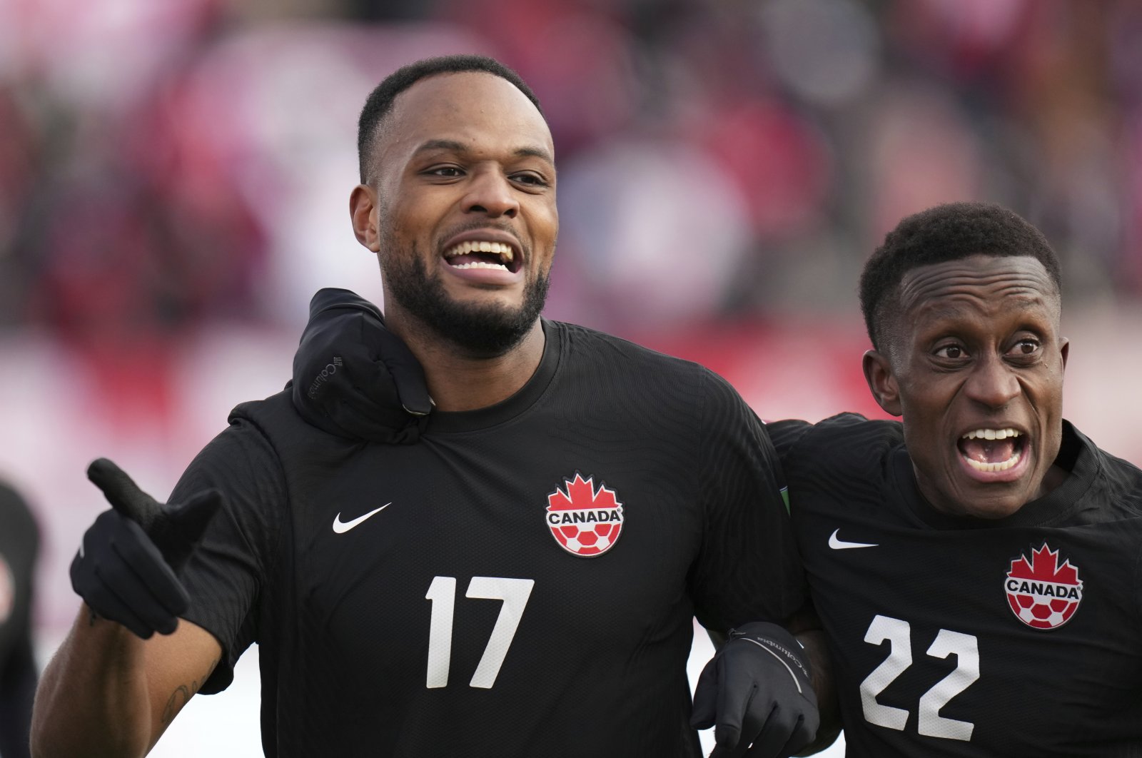 Beşiktaş&#039;s Canadian forward Cyle Larin (L) celebrates with teammate Richie Laryea after scoring goal against the U.S. in a World Cup qualifier, Hamilton, Ontario, Canada, Jan. 30, 2022. (AP Photo)