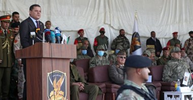 Libyan Prime Minister Abdul Hamid Dbeibah speaks during a military graduation ceremony in the capital Tripoli, Libya, Jan. 23, 2022. (AFP Photo)