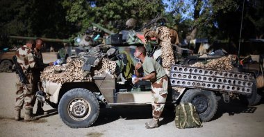 French foreign legionnaires get ready in Niono, some 400 kilometers (248 miles) north of the capital Bamako, Mali, Jan. 20, 2013. (AP Photo)