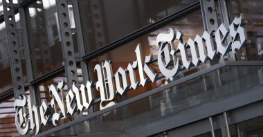 A sign for The New York Times hangs above the entrance to its building, New York City, U.S., May 6, 2021. (AP Photo)