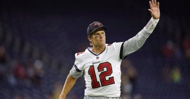 Tampa Bay Buccaneers quarterback Tom Brady waves toward the fans as he leaves the field after an NFL game against the Houston Texans, Houston, Texas, U.S., Aug. 28, 2021. (AP Photo)