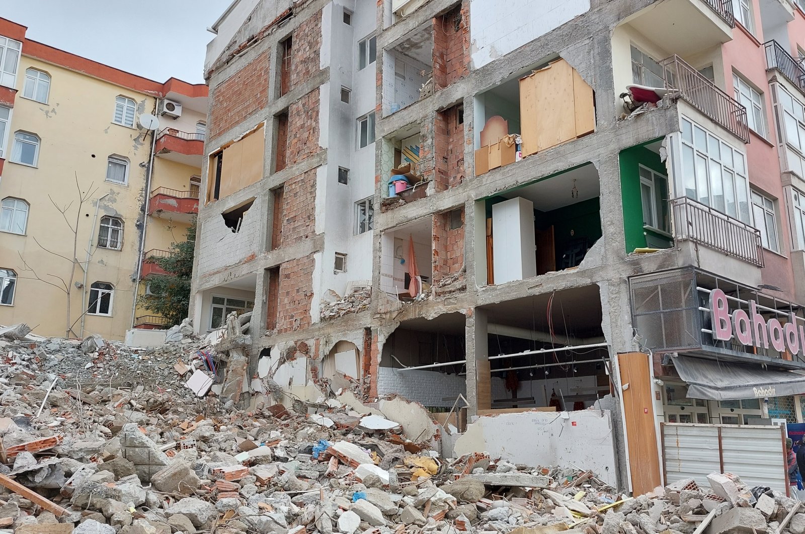 A view of the building missing a wall after the demolition of the neighboring building, in Avcılar district, Istanbul, Turkey, Feb. 1, 2022. (IHA Photo)