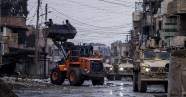 YPG terrorists search for Daesh terrorists in Hassakeh, Syria, Saturday, Jan. 29, 2022. (AP File Photo)