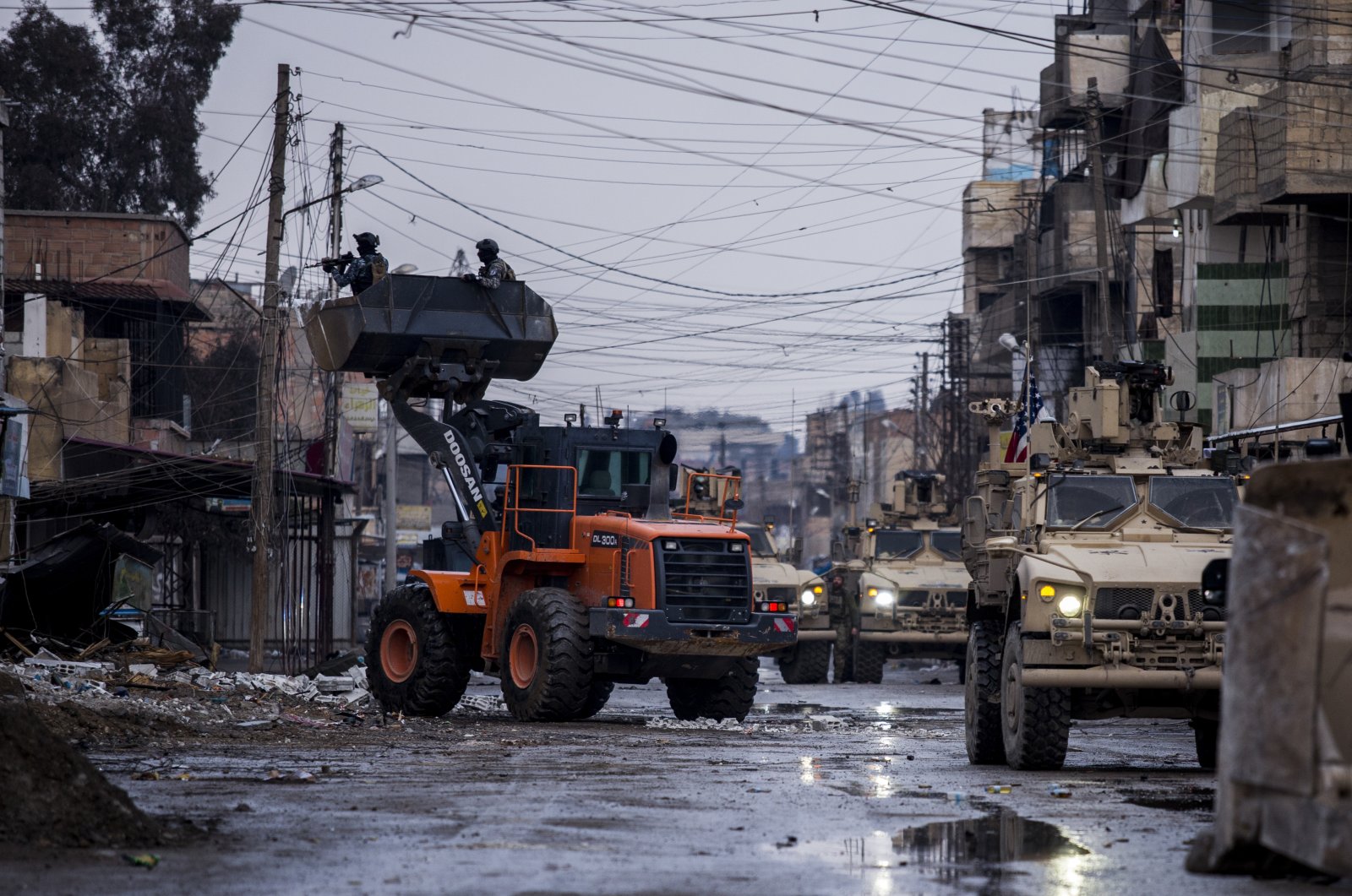 YPG terrorists search for Daesh terrorists in Hassakeh, Syria, Saturday, Jan. 29, 2022. (AP File Photo)