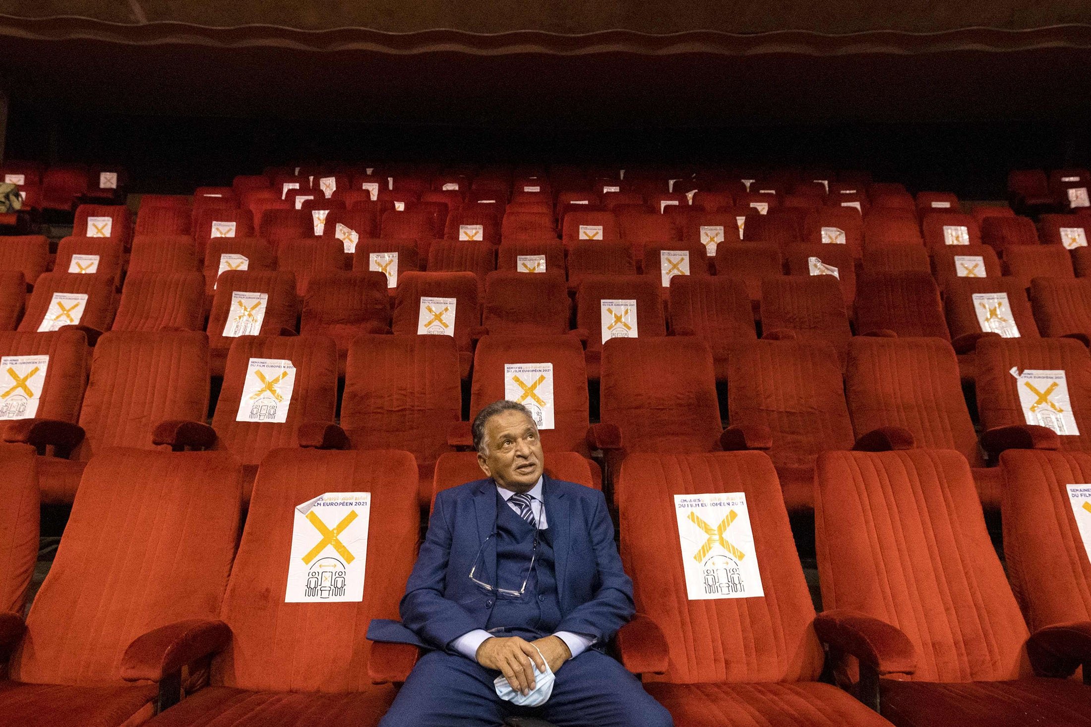Yahla Yahla, who worked as a projectionist in Morocco for 35 years, visits the empty Le Rif cinema in the western city of Casablanca, Morocco, Jan. 24, 2022. (AFP Photo)