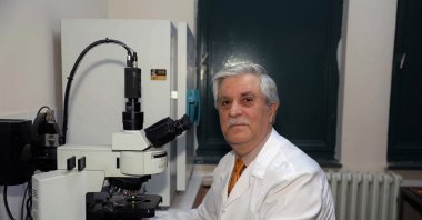 Dr. Osman Demirhan is seen in his laboratory, in Adana, southern Turkey, Feb. 2, 2022. (İHA PHOTO) 