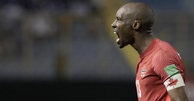 Canada&#039;s Atiba Hutchinson celebrates scoring against El Salvador in a FIFA World Cup qualifier, San Salvador, El Salvador, Feb. 2, 2022. (AP Photo)