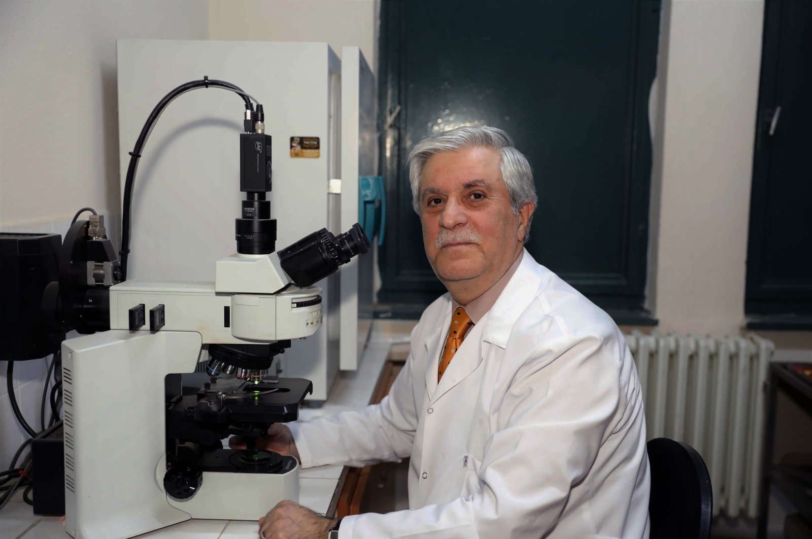Dr. Osman Demirhan is seen in his laboratory, in Adana, southern Turkey, Feb. 2, 2022. (İHA PHOTO) 