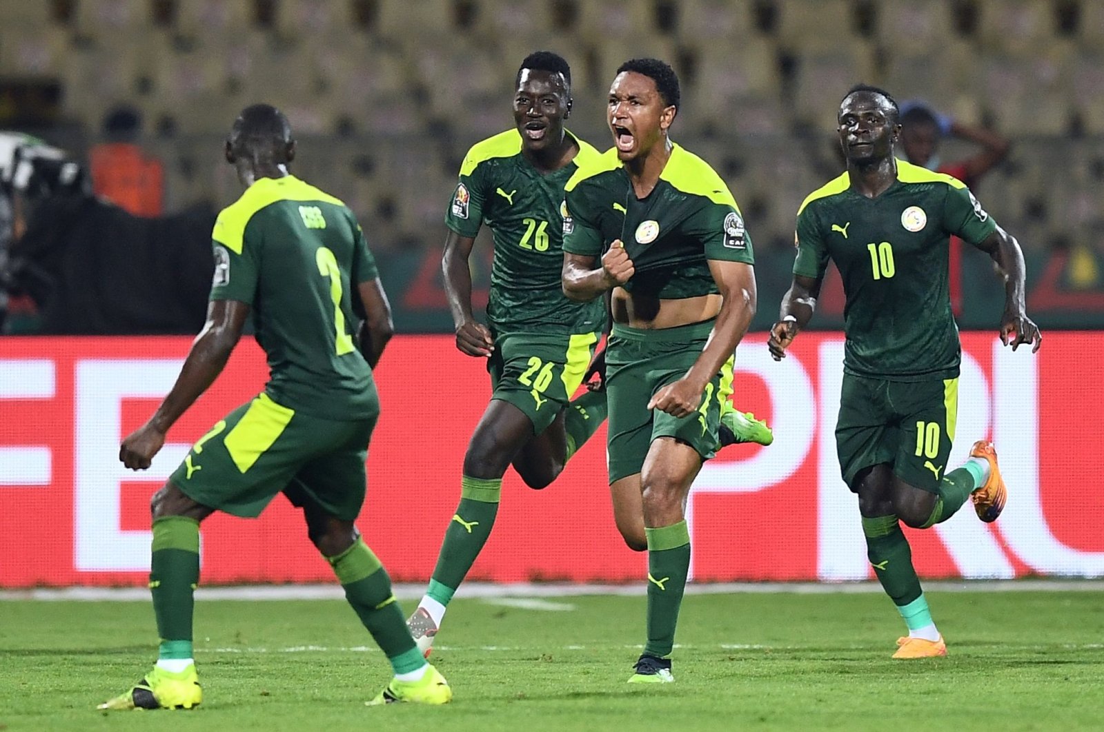 Senegal&#039;s Abdou Diallo (2nd R) celebrates after scoring in the AFCON semifinal against Burkina Faso, Yaounde, Cameroon, Feb. 2, 2022. (AFP Photo)