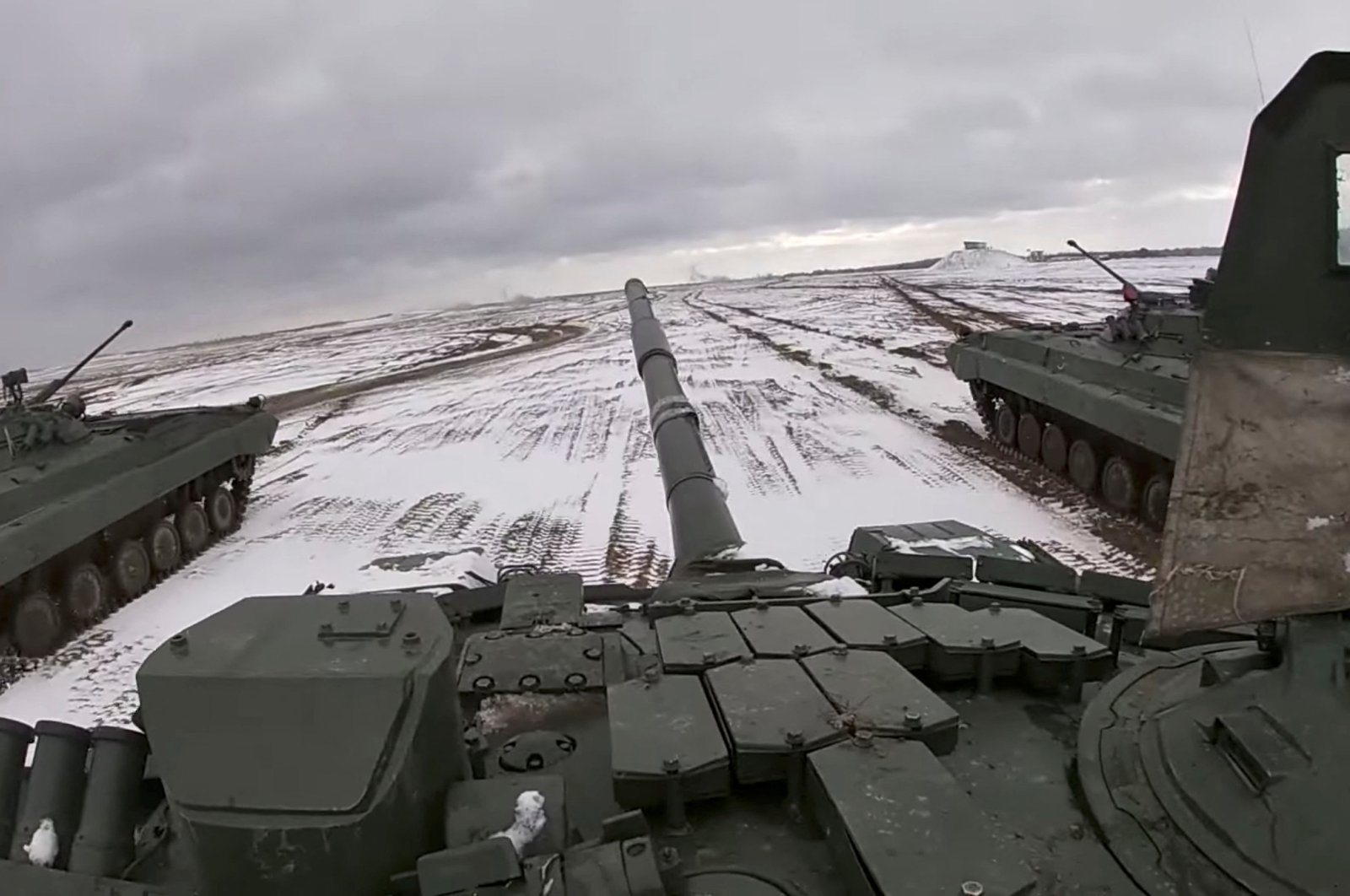 Tanks on the move during a joint exercise of the armed forces of Russia and Belarus as part of an inspection of the Union State&#039;s Response Force, at a firing range in Belarus, in this still image from a handout video released Feb. 2, 2022. (Reuters Photo)