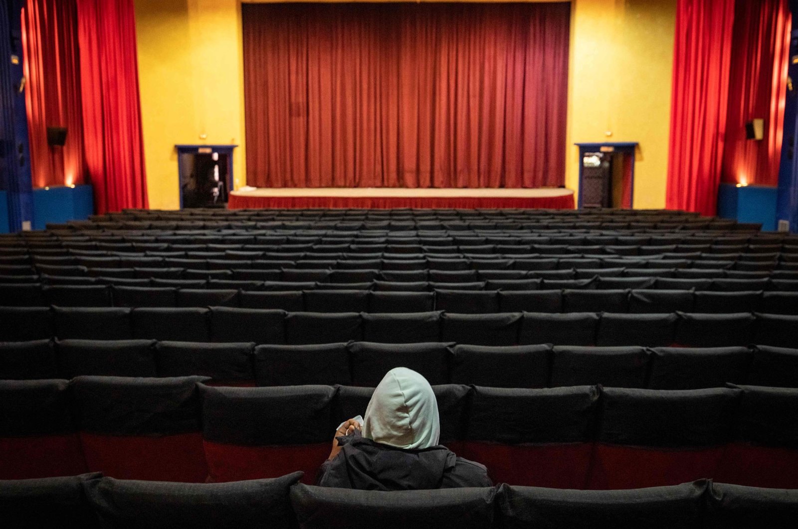 A man visits the empty Le Rif cinema in the western city of Casablanca, Morocco, Jan. 24, 2022. (AFP Photo)