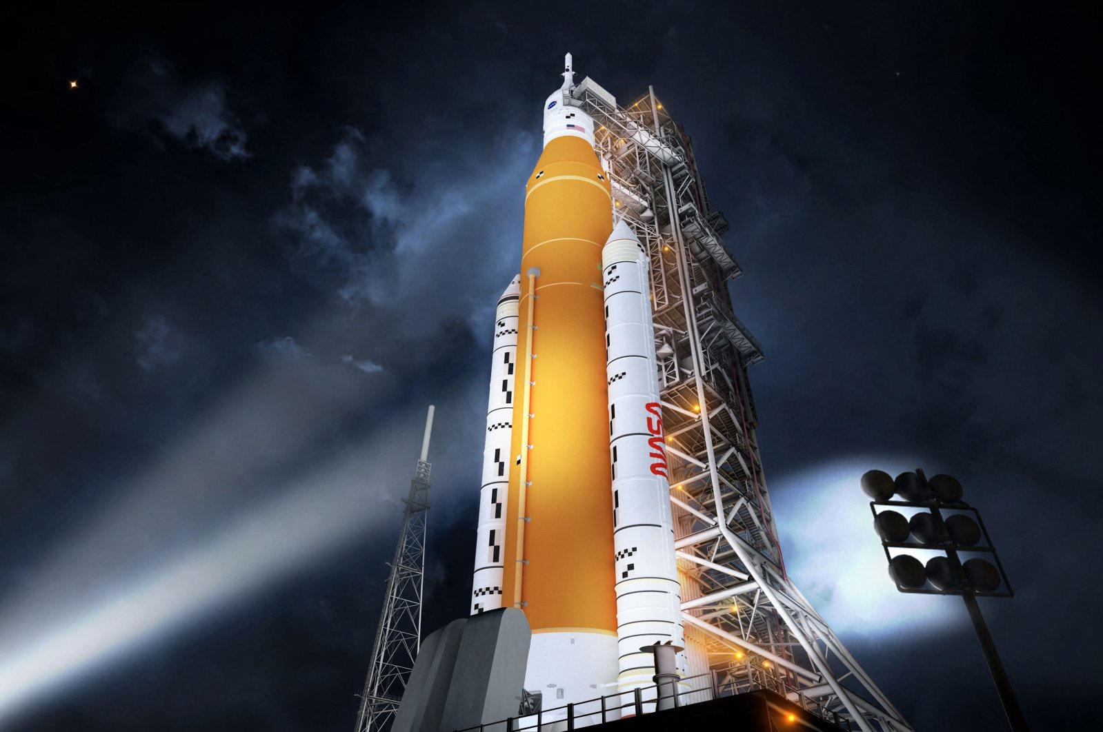 NASA&#039;s new rocket, the Space Launch System (SLS), in its Block 1 crew vehicle configuration that will send astronauts to the Moon on the Artemis missions, Aug. 19, 2014. (NASA via AFP)