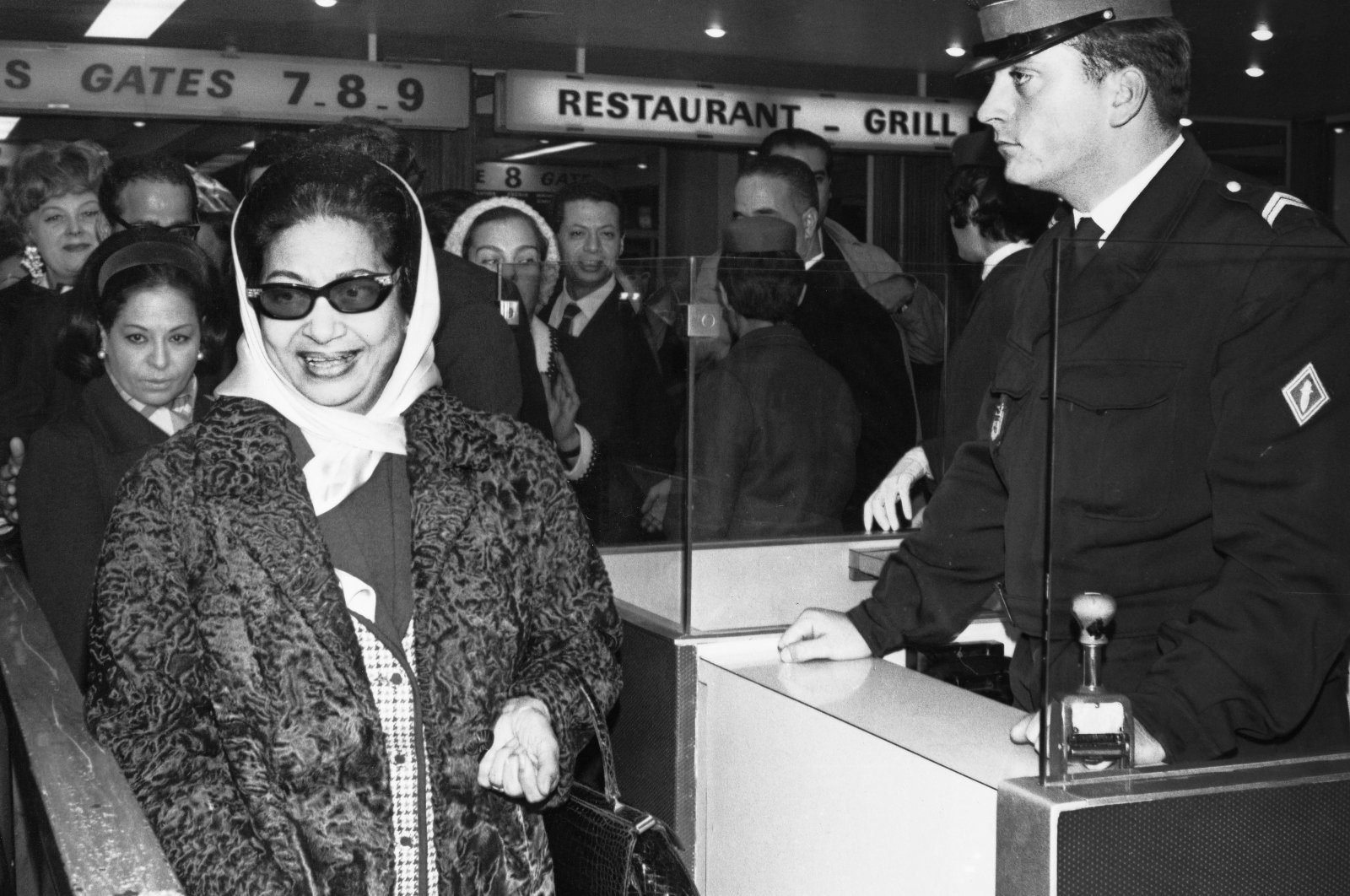 Famed Arab singer Umm Kulthum, 63 year-old, arrives at Le Bourget airport in Paris, France, Nov. 10 1967. (AP Photo)
